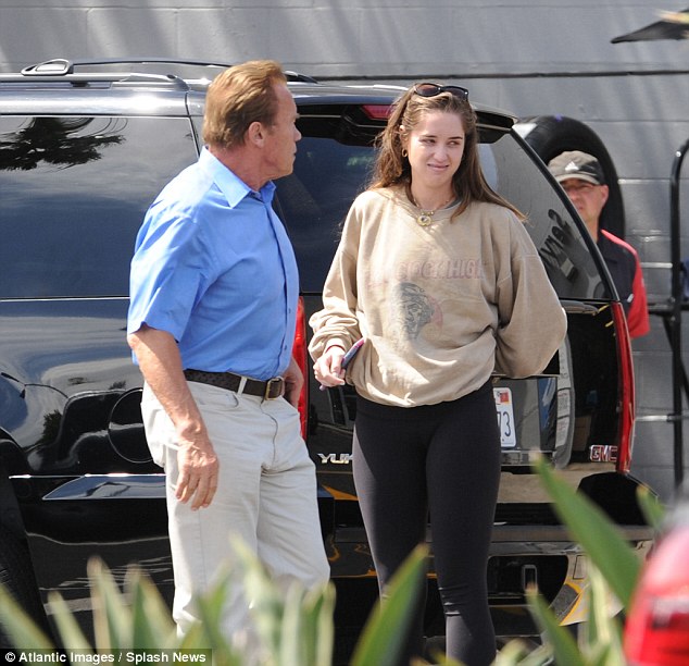 Shop till you drop: Arnold Schwarzenegger and his daughter Christina searched for a new vehicle in Los Angeles on Monday