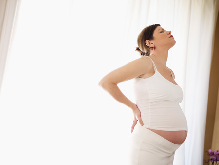 Судороги в ногах при беременности: причины и лечение